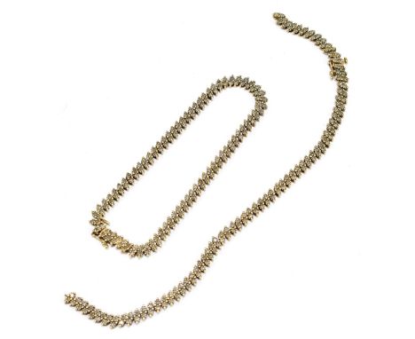 A pair of 9ct yellow gold bracelets, each set with a melee of diamonds, length 20cm, approx weight 19.7g (2).Additional Infor