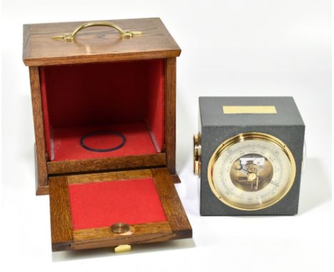 A German stone combination barometer thermometer and quartz mantel clock, with three dials, approx 17.5 x 16.5 x 13cm, with p