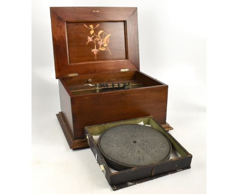 A late 19th century and later Polyphon type musical box, with eighteen 30cm discs, in a walnut case, case length 51.5cm.&nbsp