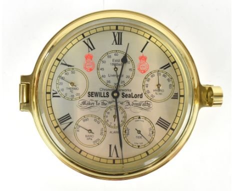 SEWILLS SEALORD: a modern brass cased ship's clock, with silvered dial bearing Roman numerals and six subsidiary dials, diame