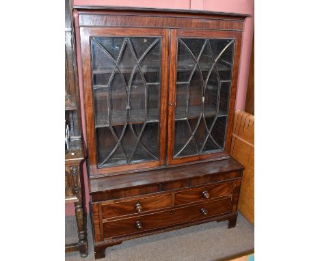 A 19th century mahogany bookcase, the upper with a pair of astragal glazed doors enclosing adjustable shelf, on a rectangular