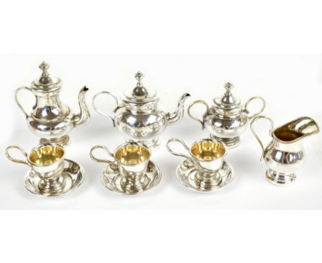 A silver plated novelty ten piece tea service in the Queen Anne style, tallest item 6.5cm.&nbsp;
