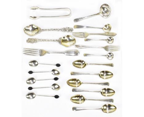 A quantity of silver and white metal flatware including coffee spoons, sifting spoon, a pair of Indian white metal spoons, fo