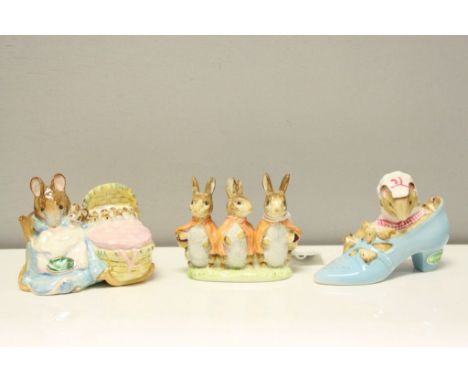 Three Beswick Beatrix Potter's Figures including Flopsy, Mopsy and Cottontail, Hunca Munca and The Old Woman who lived in a S