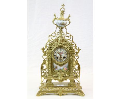 Ornate French Gilt Brass Mantle Clock, key wind with striking mechanism, the hand painted Enamel dial marked "Charpille", wit