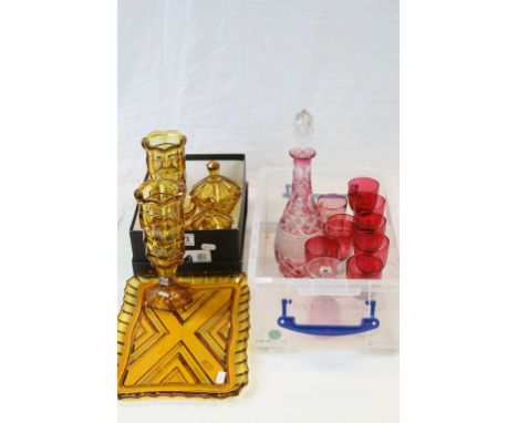 Cut Cranberry Glass Decanter together with a Set of Eight Cranberry Wine Glasses and Two other Glasses plus a 1930's Amber Gl