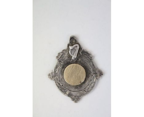 Irish silver fob medallion, blank circular gold plated cartouche to centre, celtic design surround, Irish harp to top, makers