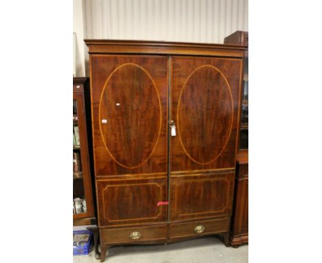 George III Mahogany Inlaid Clothes Press / Wardrobe, Two Doors opening to reveal hanging space above Two Drawers, raised on s