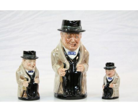 Royal Doulton ceramic set of three Winston Churchill Toby jugs in graduating sizes, the largest being approx 22cm tall