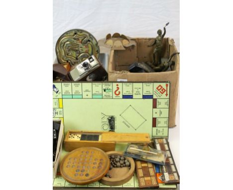 Two boxes of mixed collectables to include a pair of Spelter figures, D8 Cine Camera, various Games to include Cribbage board