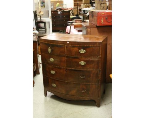 Early 19th century Mahogany Bow Fronted Chest of Two Short over Three Long Drawers raised on splay bracket feet, 99cms wide x