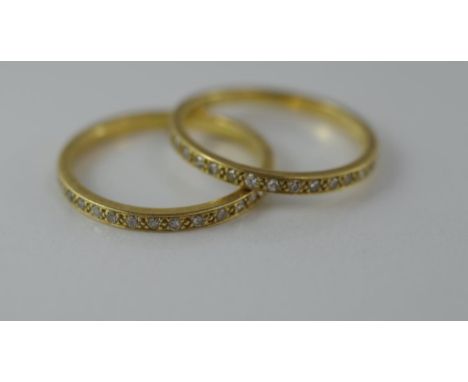 A pair of 18ct yellow gold and diamond hoop rings one marked 750, with 3/4 hoop of diamonds, total weight approx 4.75 grams, 