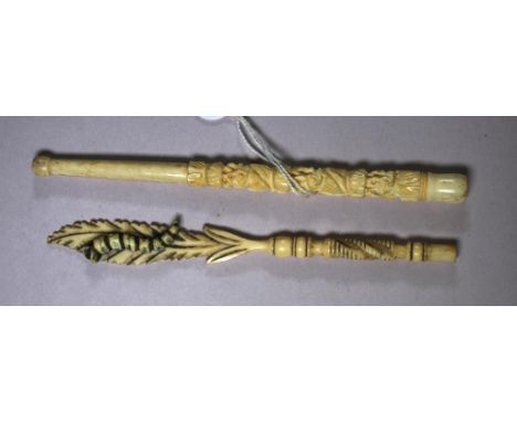 Antique carved ivory pen holder C1900, length 15.5cm (longest). together with a carved cigarette holder. NB This item may not