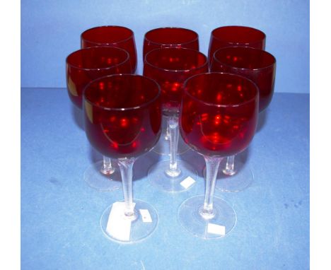 Set eight ruby glass wine glasses clear glass stems.