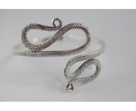 A large snake inspired bangle marked 925
