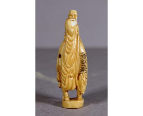 Antique Japanese carved ivory netsuke signed to base. Export of this item is not permitted.  Height 6cm approx.