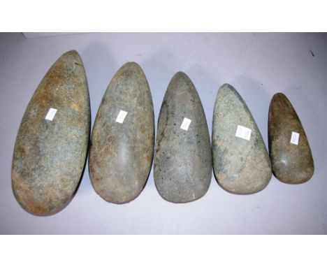 Five various Papua New Guinea stone axe heads collected from the Mount Hagen area during the 1970s 1980s. Length 31cm approx 