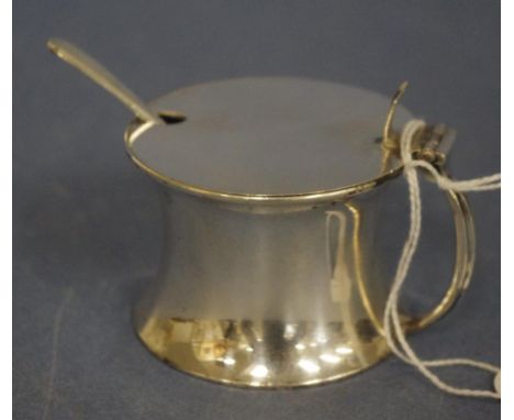 George V sterling silver mustard pot Sheffield 1916, makers Atkin Brothers, with blue glass liner, (rim chip); together with 