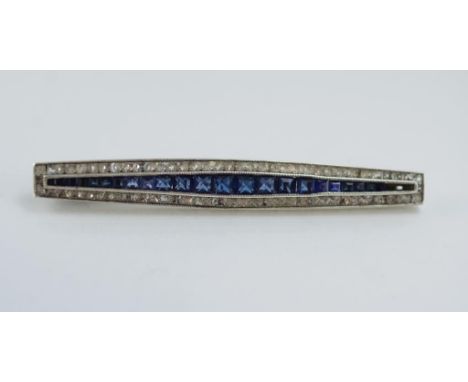 A good silver and paste bar brooch unmarked but tested as silver