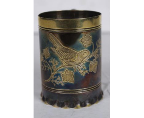 Vintage engraved silver mug possibly of Russian origin, (no marks evident), engraved bird and foliage decoration. Height 7.5c