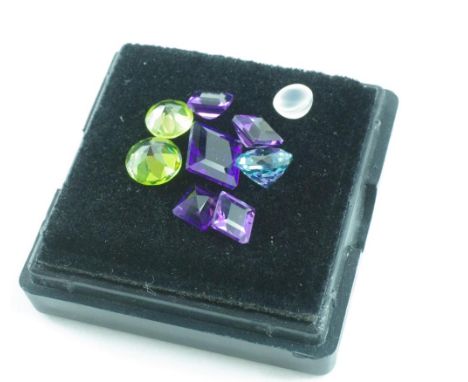 Various unset gemstones and paste including 4.35ct amethyst