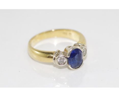 18ct gold diamond & sapphire ring yellow gold, stamped 750, one central sapphire, with a diamond to each shoulder. Weight 5.2