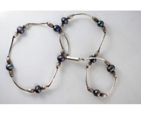 A silver and pearl necklace with magnetic clasp, approx 44cm length, unmarked but tested as silver