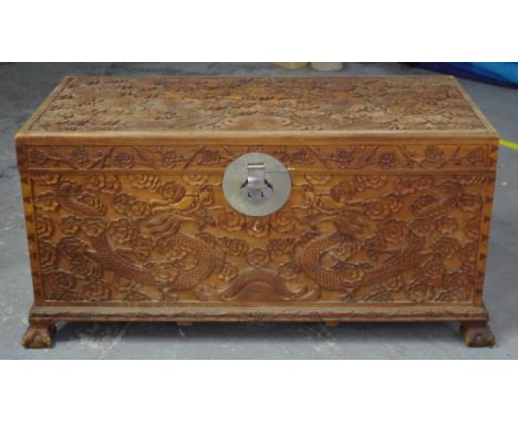 Large Chinese carved trunk 130cm wide, 63cm deep, 61cm high