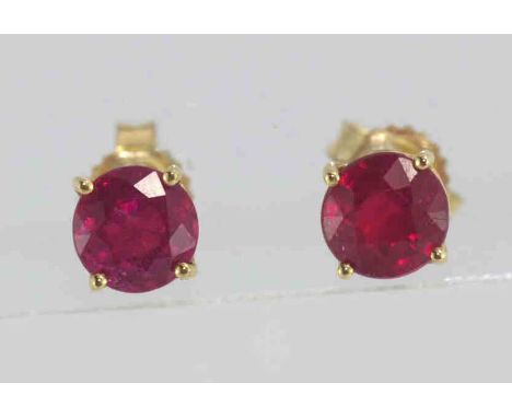 10ct yellow gold and ruby studs weight: approx 0.8 grams