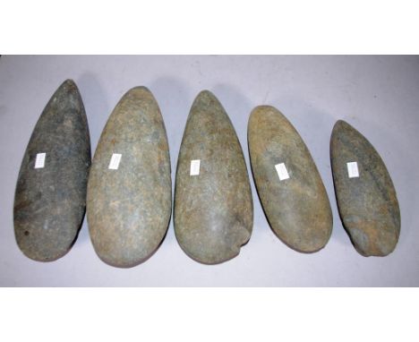 Five various Papua New Guinea stone axe heads collected from the Mount Hagen area during the 1970s 1980s. Length 26cm approx 