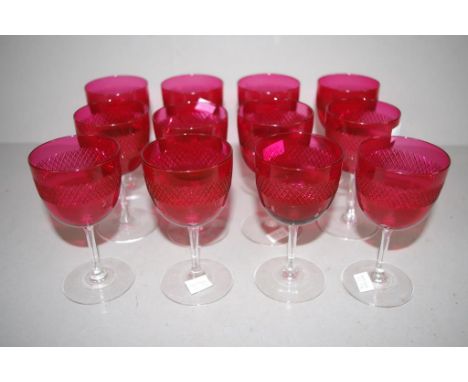 Twelve Victorian ruby red cut wine glasses