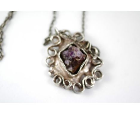 A vintage Danish silver pendant set with amethyst marked S Denmark