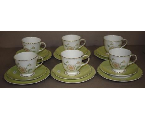 Eighteen piece Susie Cooper tea set 'Wild Rose,' pattern, including 6 cups, saucers and plates.