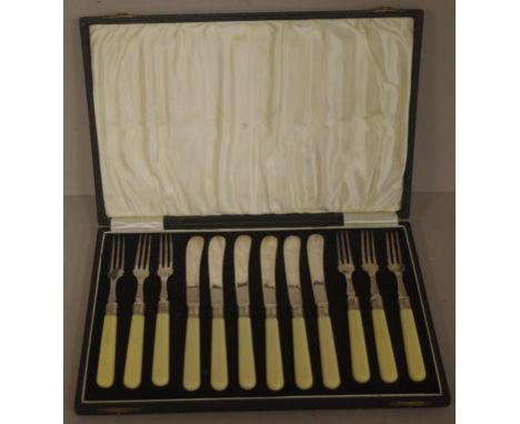 Cased vintage bone handle fruit set for six to include 6 fruit knifes and 6 fruit forks, with hallmarked Sheffield 1930 sterl