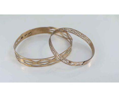 Two vintage silver lined gold arm bands both with variable sizing