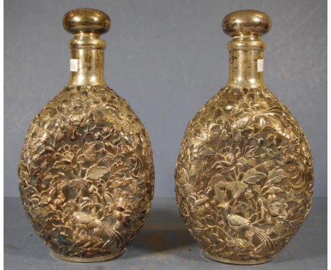 Pair Chinese Tianjin silver cased decanters silver pierced cased, with embossed peacock and foliage decoration, silver stoppe