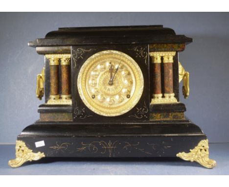 Vintage American wood cased mantle clock ebonised finish, gilded dial, faux marble columns, and gilded metal handles, on gild