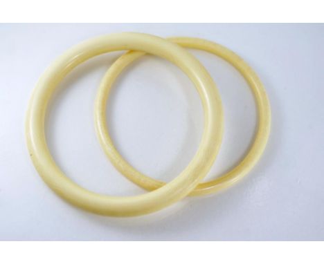 Two good vintage ivory bangles provenance from a private collection, NB This item may not be exported without CITES documenta