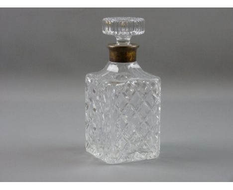 A SQUARE SECTION GLASS DECANTER and stopper with sterling 925 silver collar, 22.5 cms high