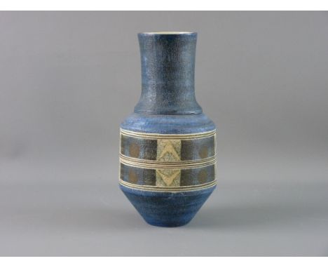 A TROIKA POTTERY URN SHAPED VASE having central geometric bands on a textured blue ground, marked to the base 'Troika' with m