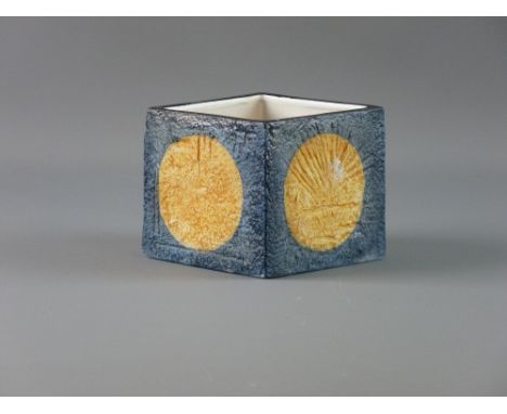 A TROIKA POTTERY SQUARE SECTION VASE, each side with a central orange disc with blue surround and textured finish, marked to 