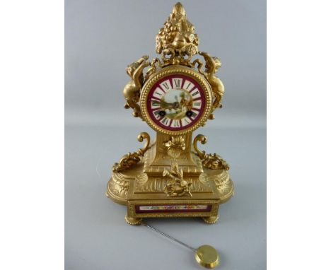 A FRENCH GILT METAL AND PORCELAIN MANTEL CLOCK typically modelled with ormolu mounts, the pendulum driven movement striking o