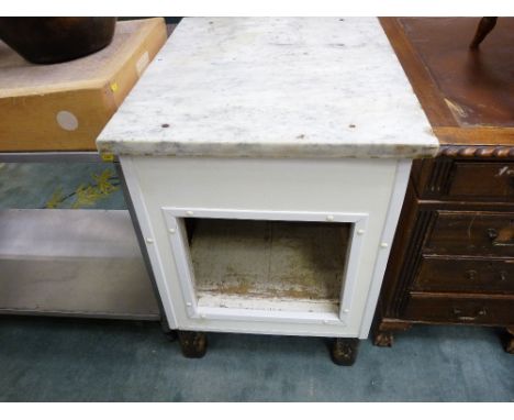 *A MARBLE TOPPED CUPBOARD with base shelf/opening