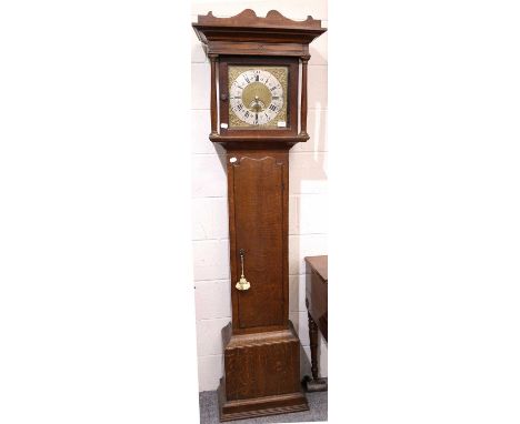 An Oak Thirty Hour Striking Longcase Clock, 11 inch square brass dial, with silvered chapter ring, signed Phillips, Ashburn, 