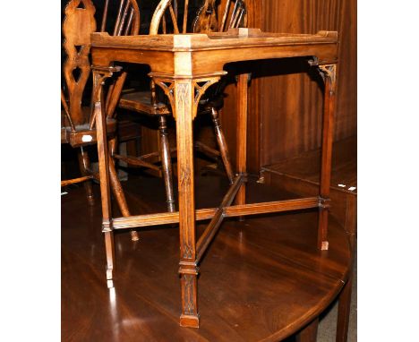 A Chippendale Style Mahogany Tray Topped Silver Table, with canted corners, open spandrels and blind fret supports with cross