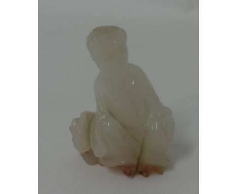 A carved jade? Buddha, approx 45mm.