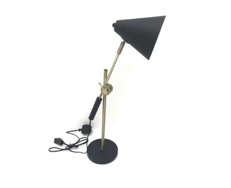 Brass and black finish adjustable desk lamp with cone shaped shade,  on circular base, H72cm max