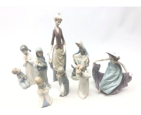 Collection of Lladro figures comprising 'May Dance' no. 5662, Girl with Dog no. 4761, Girl with Rabbit and five figures of Ch