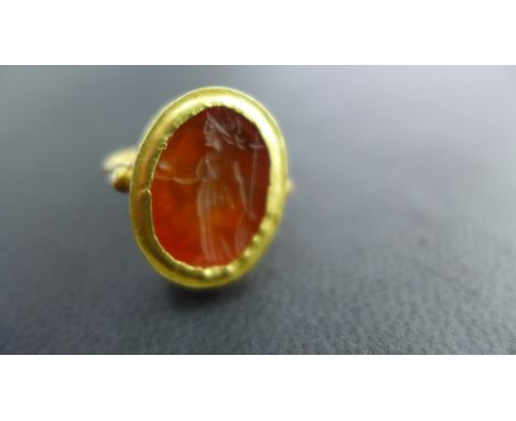 An Ancient Roman fine gold intaglio ring 2nd AD - size J 
Condition report:  Good overall condition -this is an Antique item 
