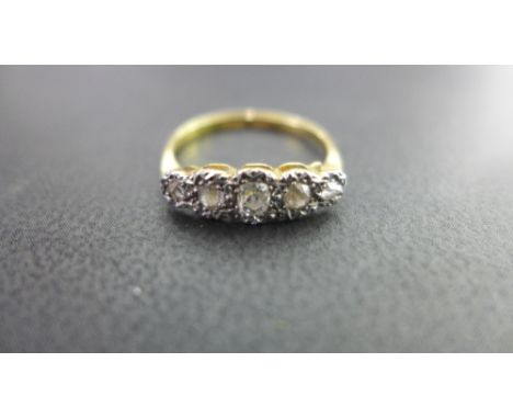 An early 20th century and platinum old and rose-cut diamond graduated five-stone ring - Ring size N - Weight approx 2.0gms
Co